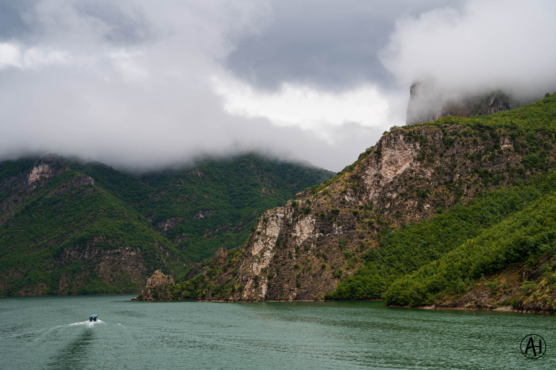 Low cloud over a mountain lake